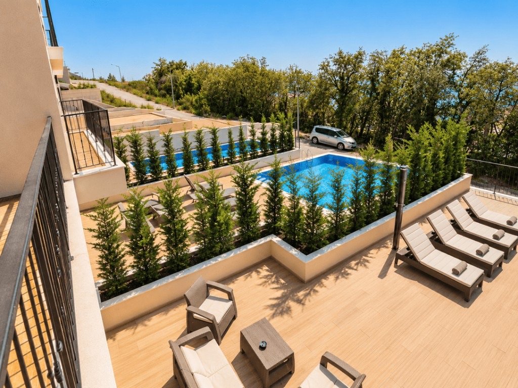 Townhouse A1 terrace overlooking the pools