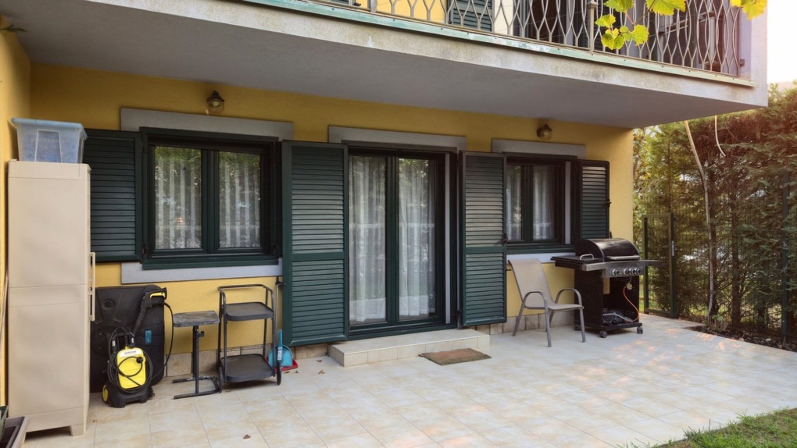 Lastva House ground-floor terrace with shutters and BBQ