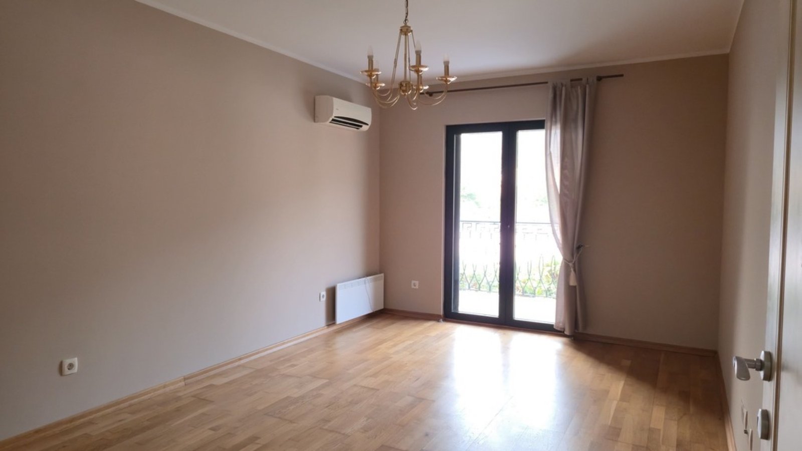 Lastva House bedroom with balcony doors
