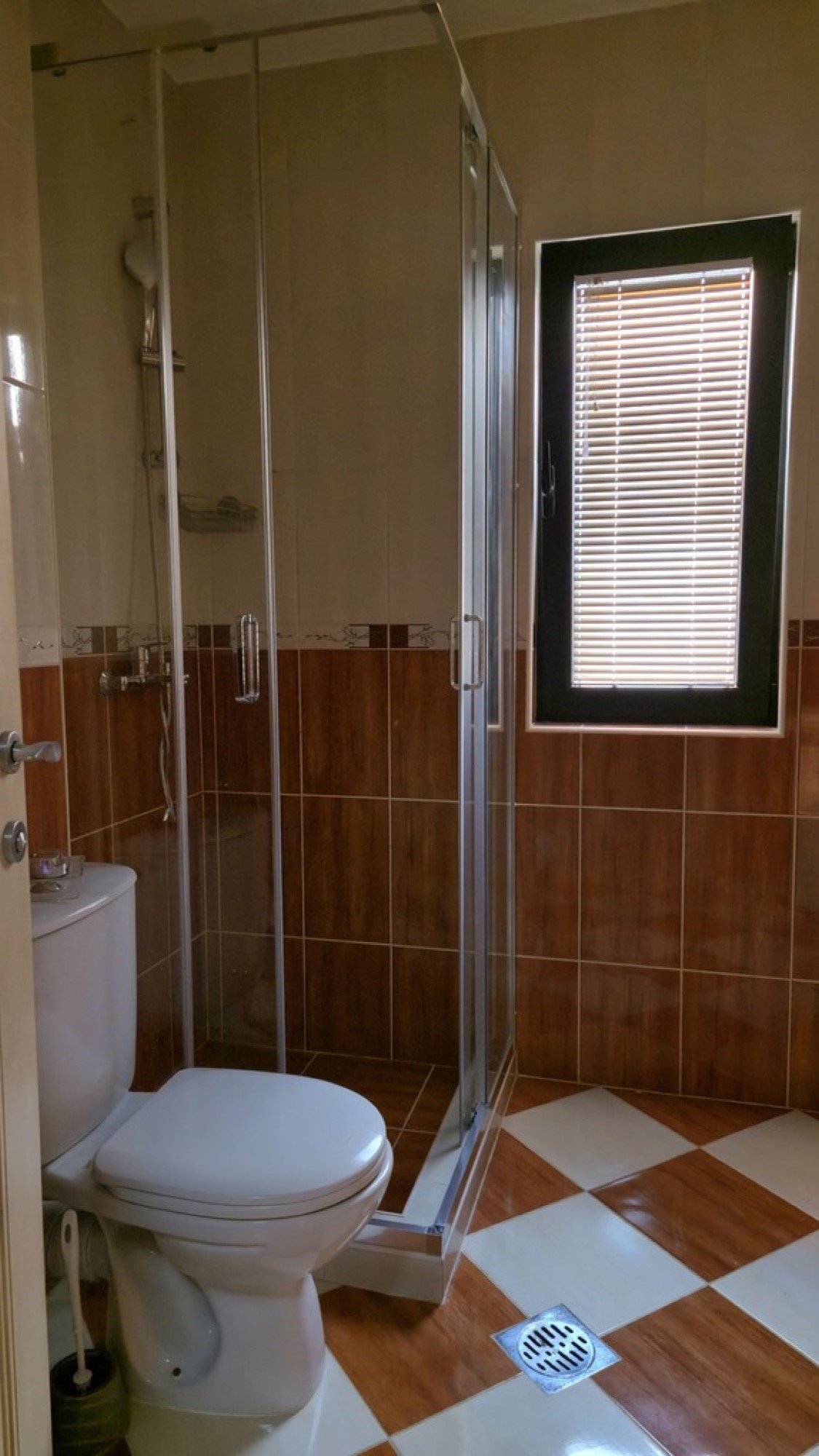 Lastva House bathroom with shower and water heater