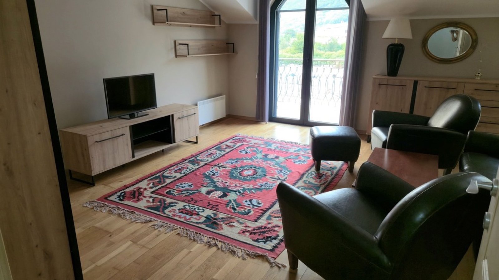 Lastva House master lounge with leather seating
